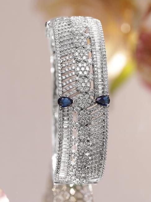 Rubans Rhodium-Plated Floral Design Bracelet with Blue Sapphire & Cubic Zirconia