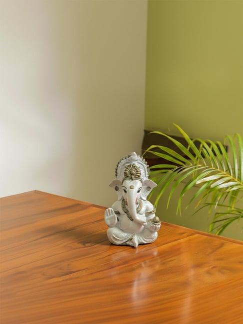 Exclusivelane Golden and White Resin Hand Painted Ganesha Idol