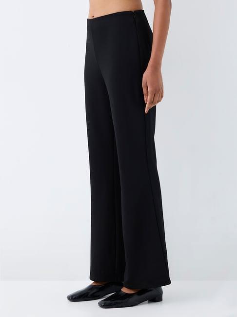 Wardrobe by Westside Black Solid Flared High-Rise Trousers