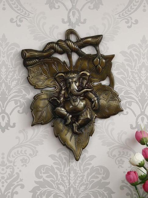 eCraftIndia Antique Finish Lord Ganesha on Creative Leaf Handcrafted Metal Wall Hanging
