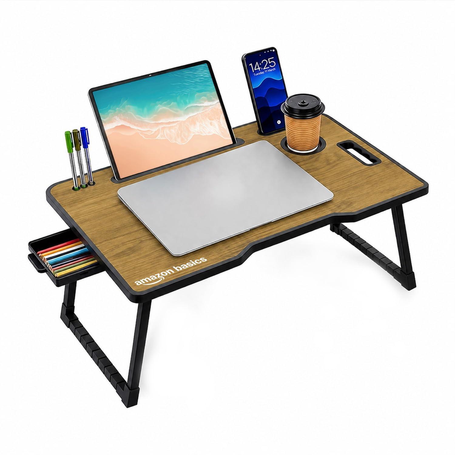 Amazon Basics Engineered Wood Foldable Laptop Table with Cup and Pen Holder, Tablet and Mobile Phone Groove | Mini Drawer, Use for Writing, Bed, Breakfast (60L x 40W x 25H cm, Brown)