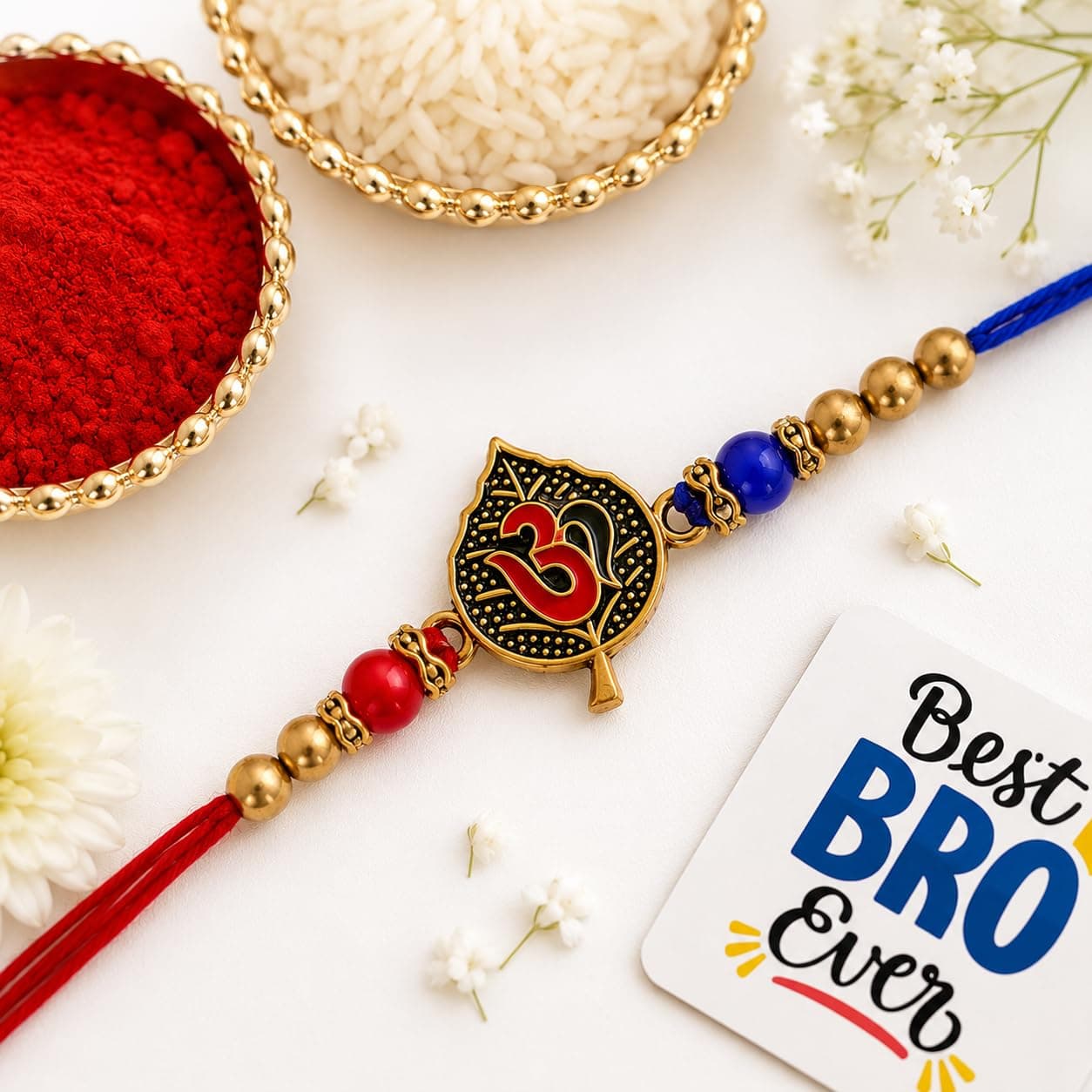 eCraftIndia Red & Blue Om Symbol On A Leaf Designer Rakhi, Best Bro Ever Fridge Magnet with Roli Chawal Pack - Rakhi for Brother, Bhaiya, Bhai