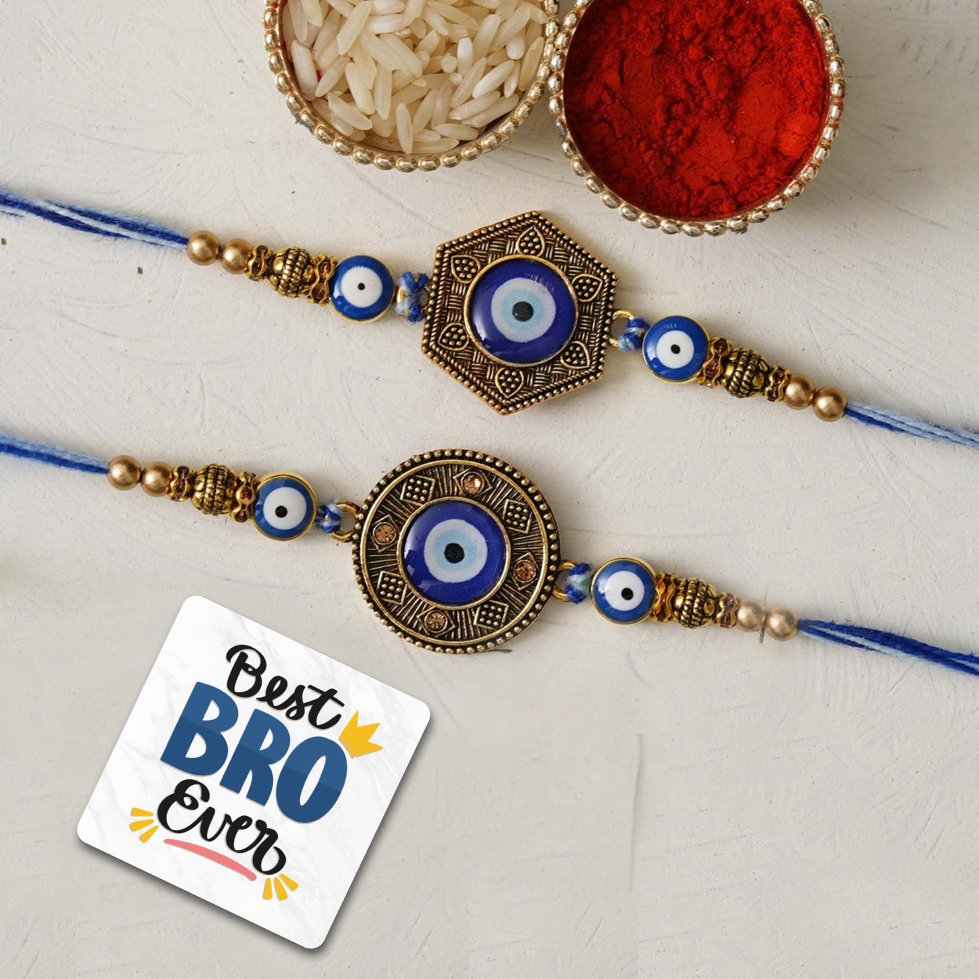 eCraftIndia Set of 2 Designer Evil Eye Rakhis for Brothers with Best Bro Ever Fridge Magnet and Roli Chawal Pack