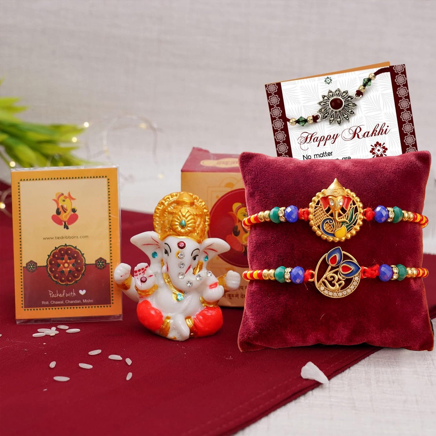 TIED RIBBONS Rakhi for Brother with Gift - Set of 2 Premium Rakhi with Mini Idol Statue Mini Greeting Card and Roli Chawal Tika- Rakhi Gift for Brother