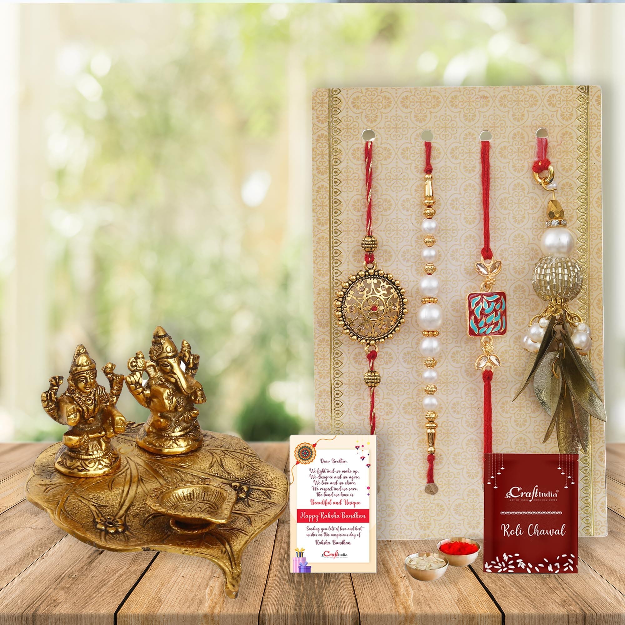 eCraftIndia Set of 4 Floral, Pearls, Diamonds, Lumba Designer Rakhis with Laxmi Ganesha Idols and Roli Chawal Pack, Raksha Bandhan Greeting Card - Rakhi for Brother - Lumba Rakhi for Sister In Law