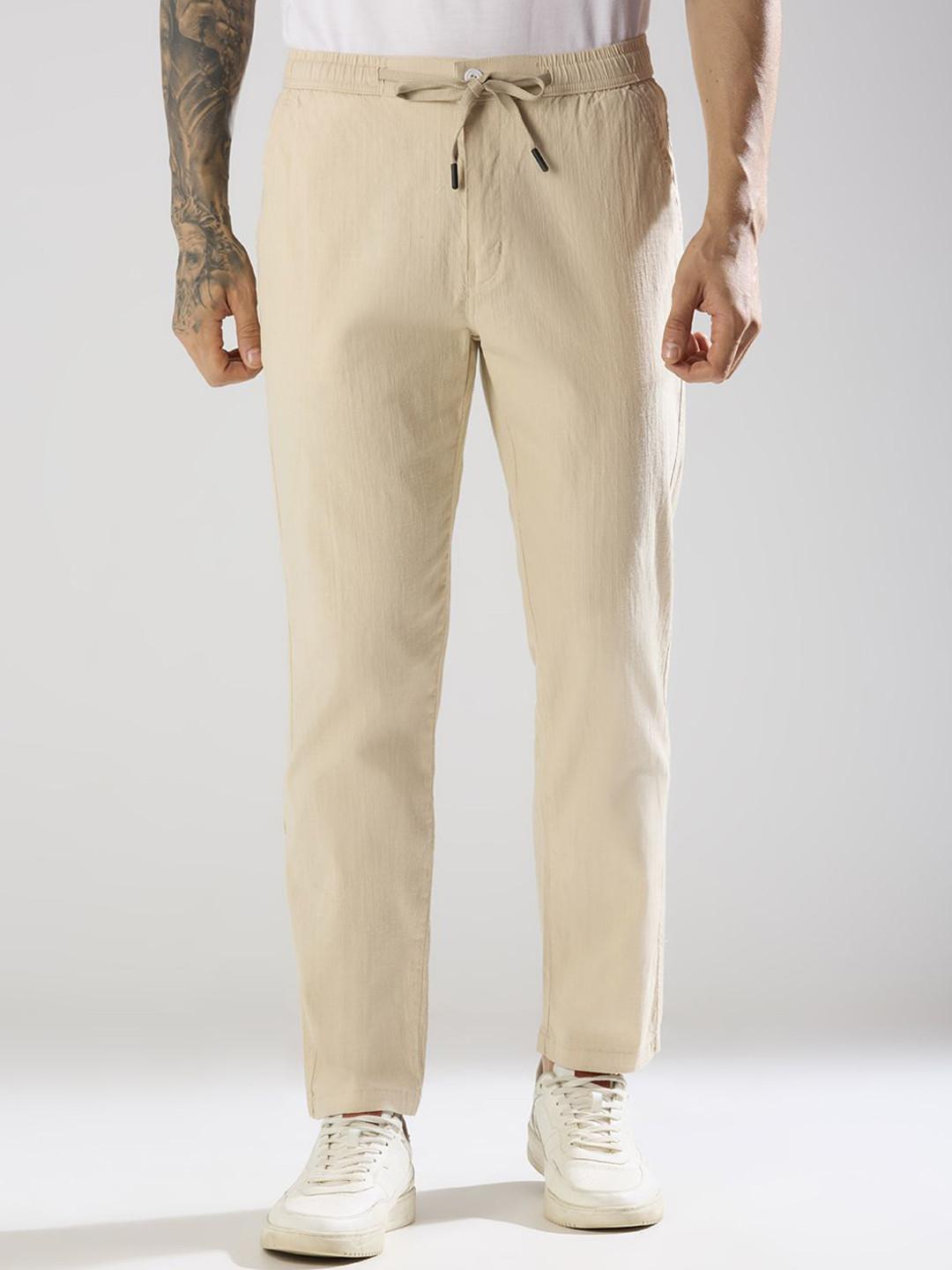 TCI Men Solid Relaxed Relaxed Fit Mid-Rise Flat-Front Regular Trousers