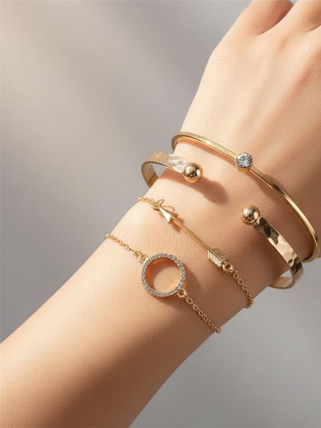 DressBerry Women 4 Cubic Zirconia Gold-Plated Cuff Bracelet