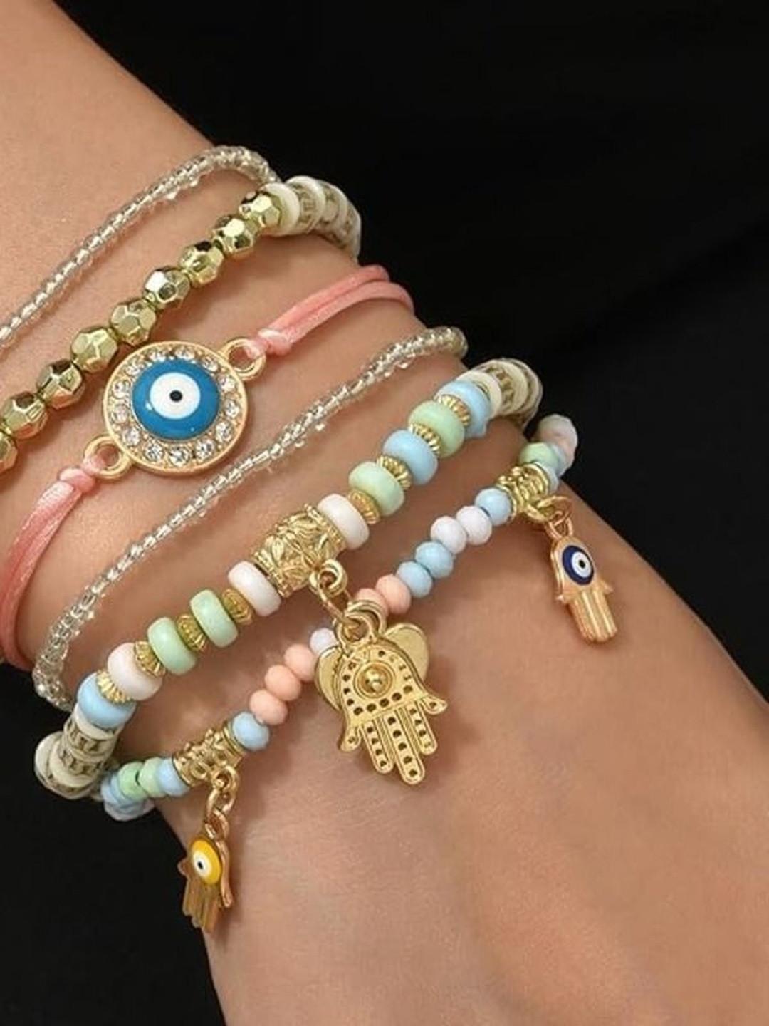 Zaphariq Women 6 Charm Bracelet