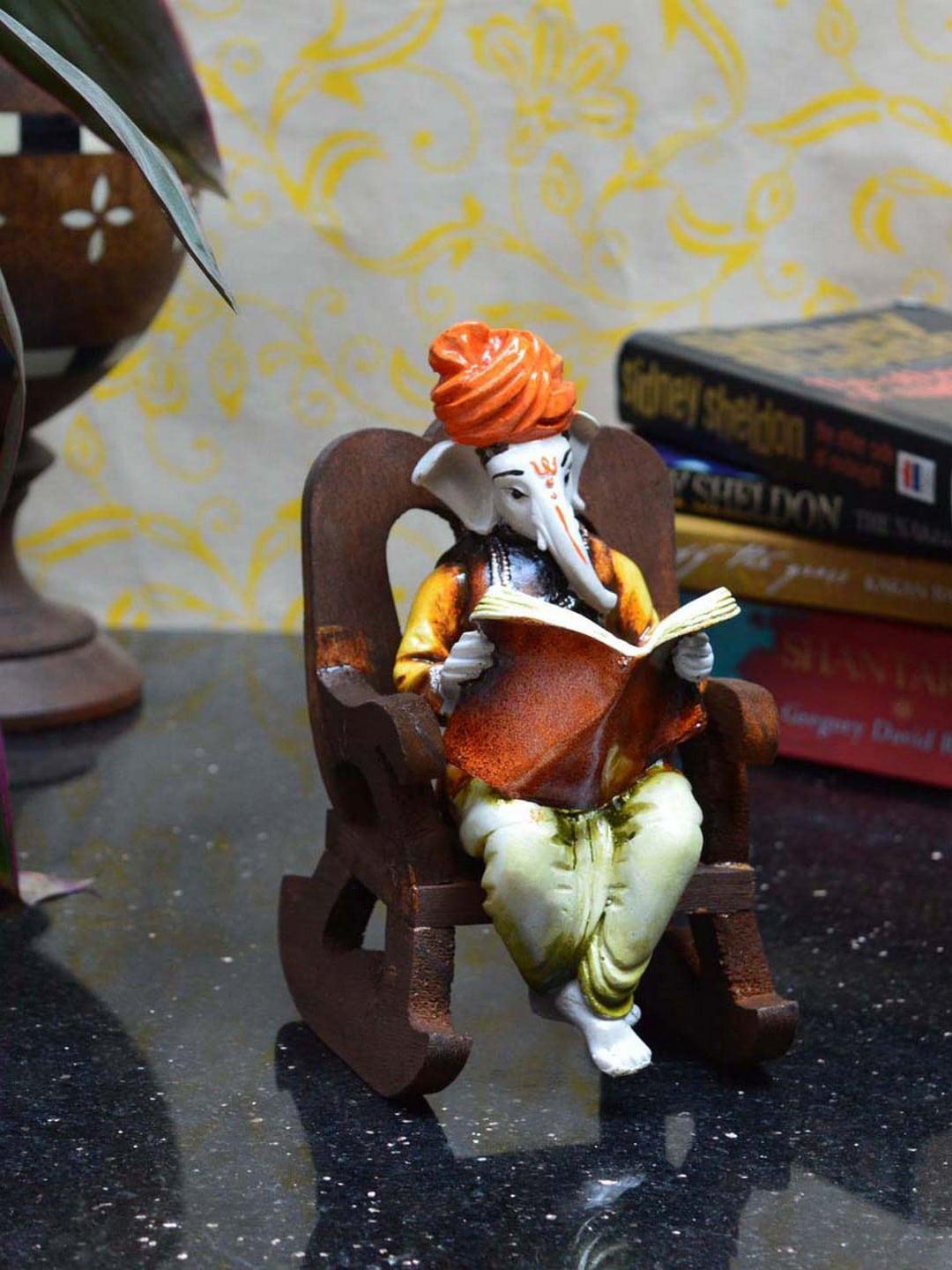 Artisyn Lord Ganesha Reading Book on Chair Orange Polyresin Glossy Prayer Room Medium Showpiece - 6.3 Inches