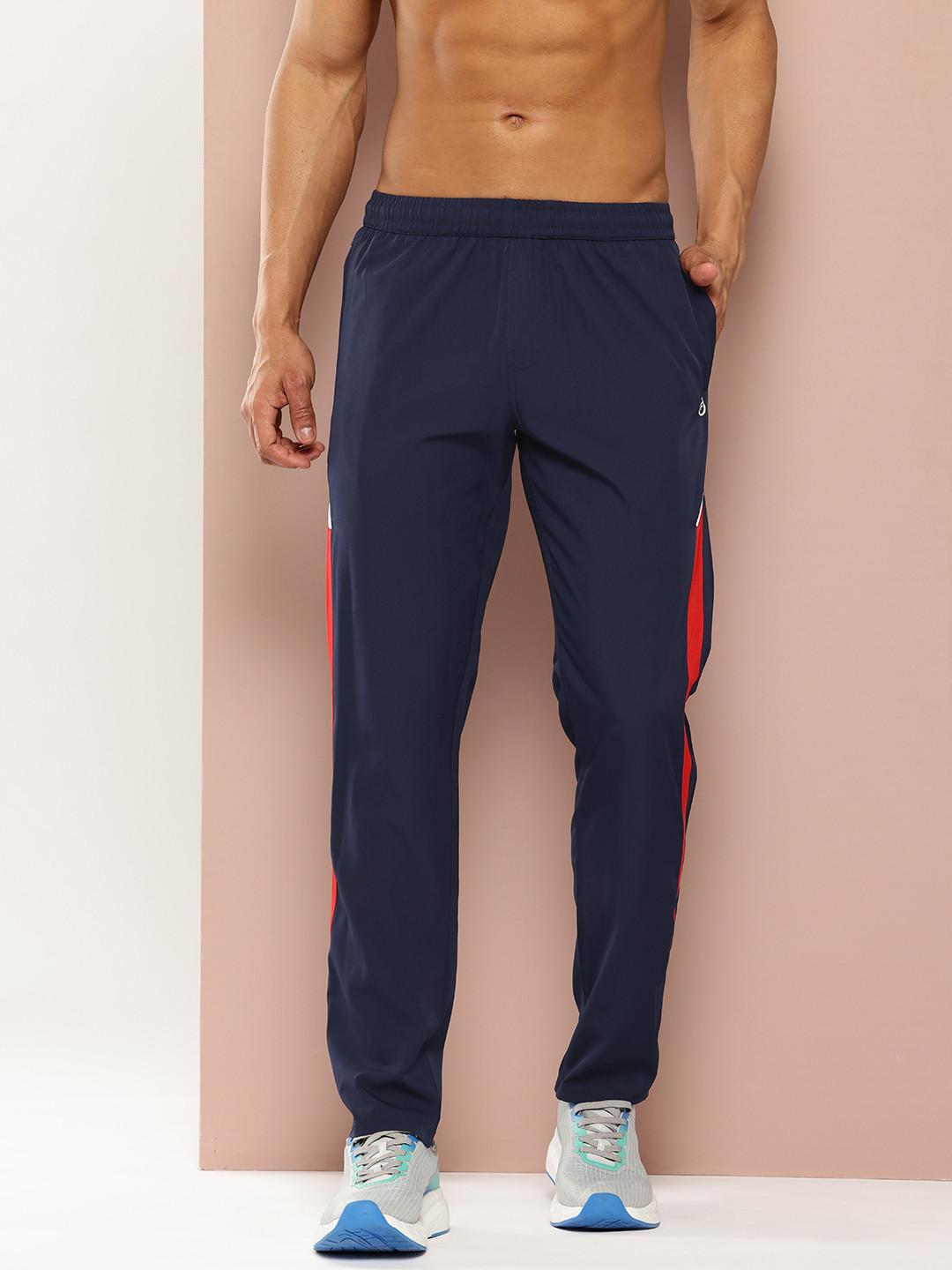 TURNFIT Men Straight Fit Gym Track Pants With Side Striped Detail