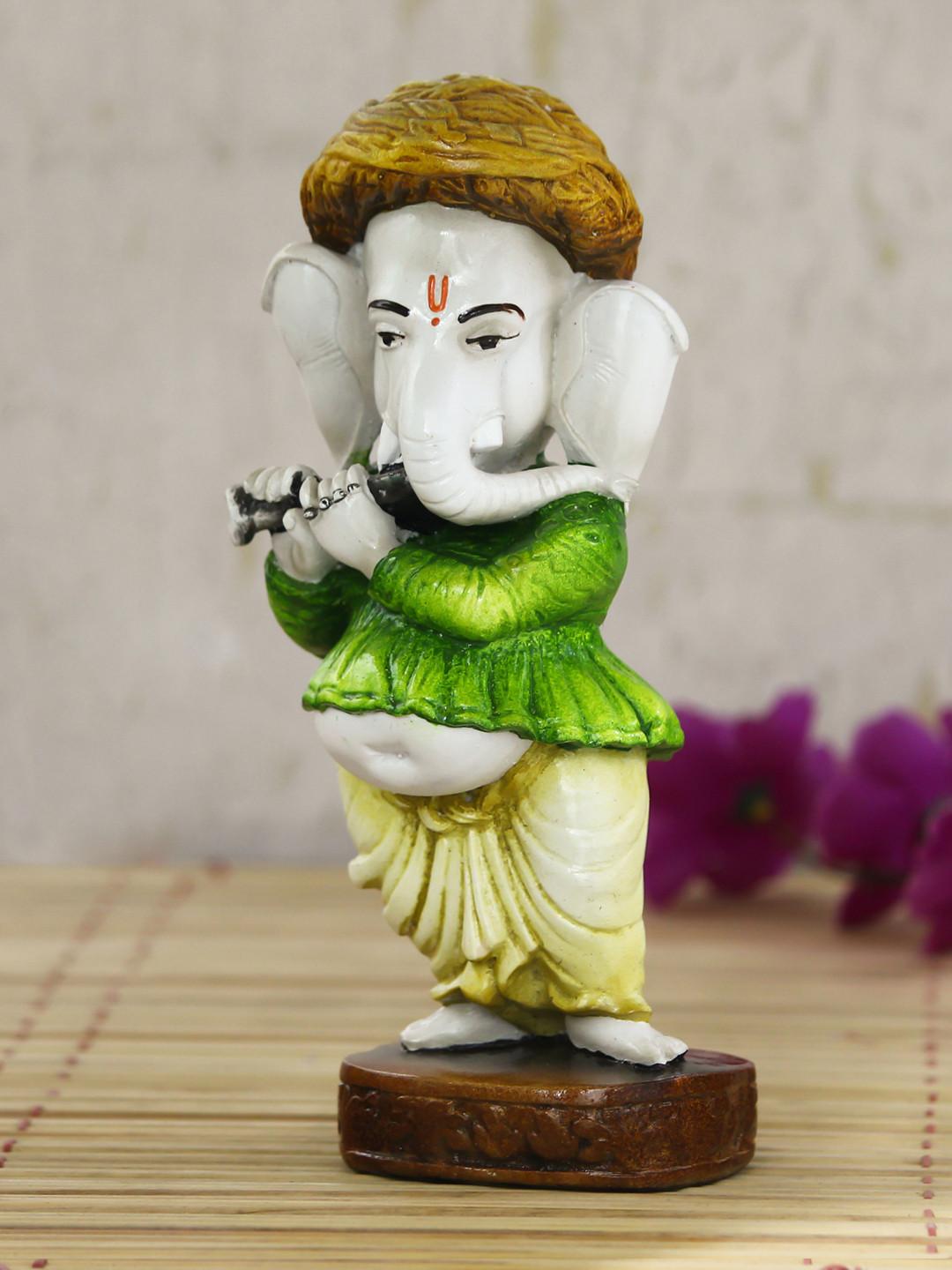 Artisyn Lord Ganesha Playing instument Yellow Polyresin Glossy Prayer Room Small Showpiece - 2 Inches
