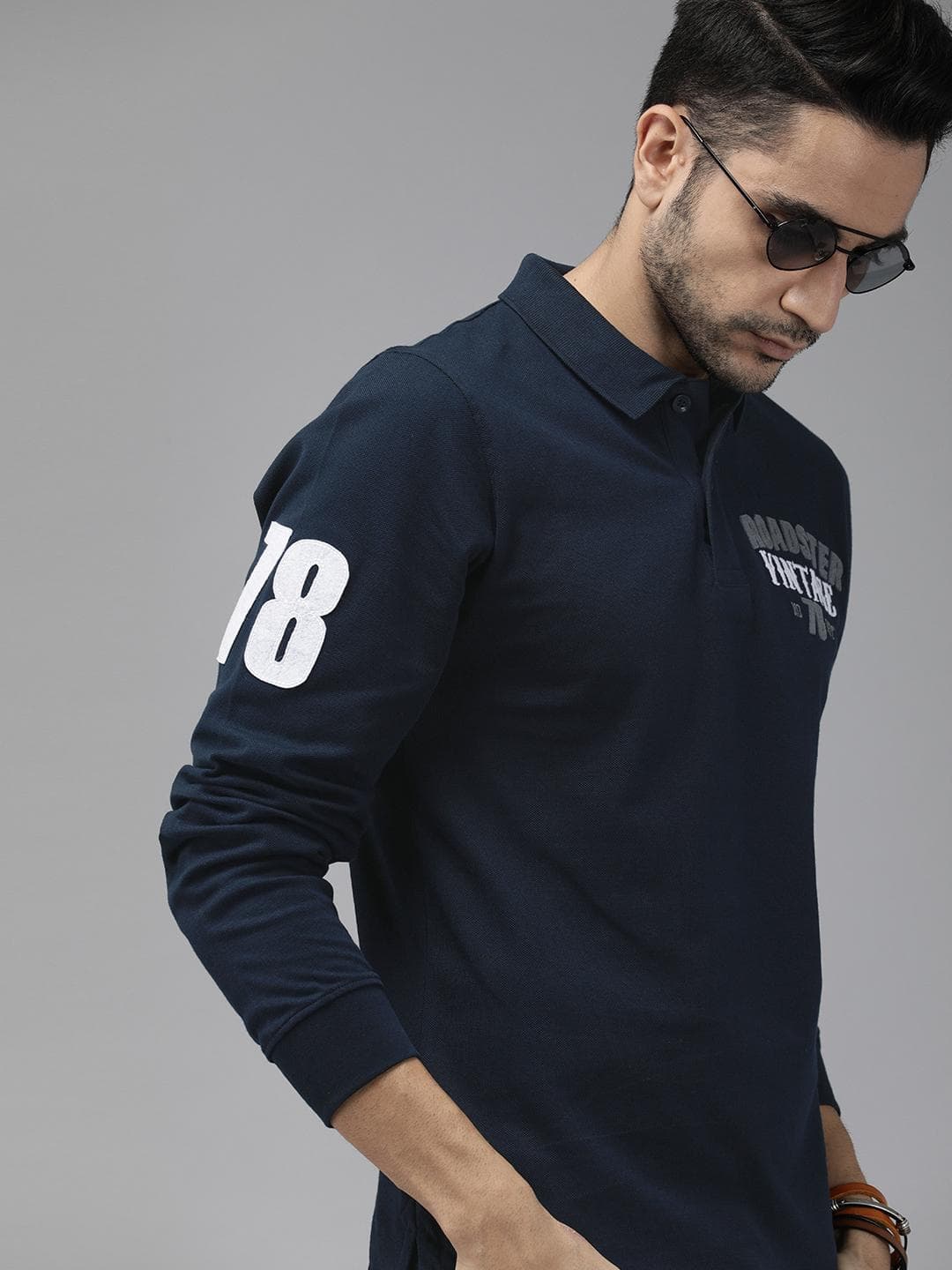 The Roadster Lifestyle Co Men Navy Blue Solid Embroidered Polo Cotton T-shirt