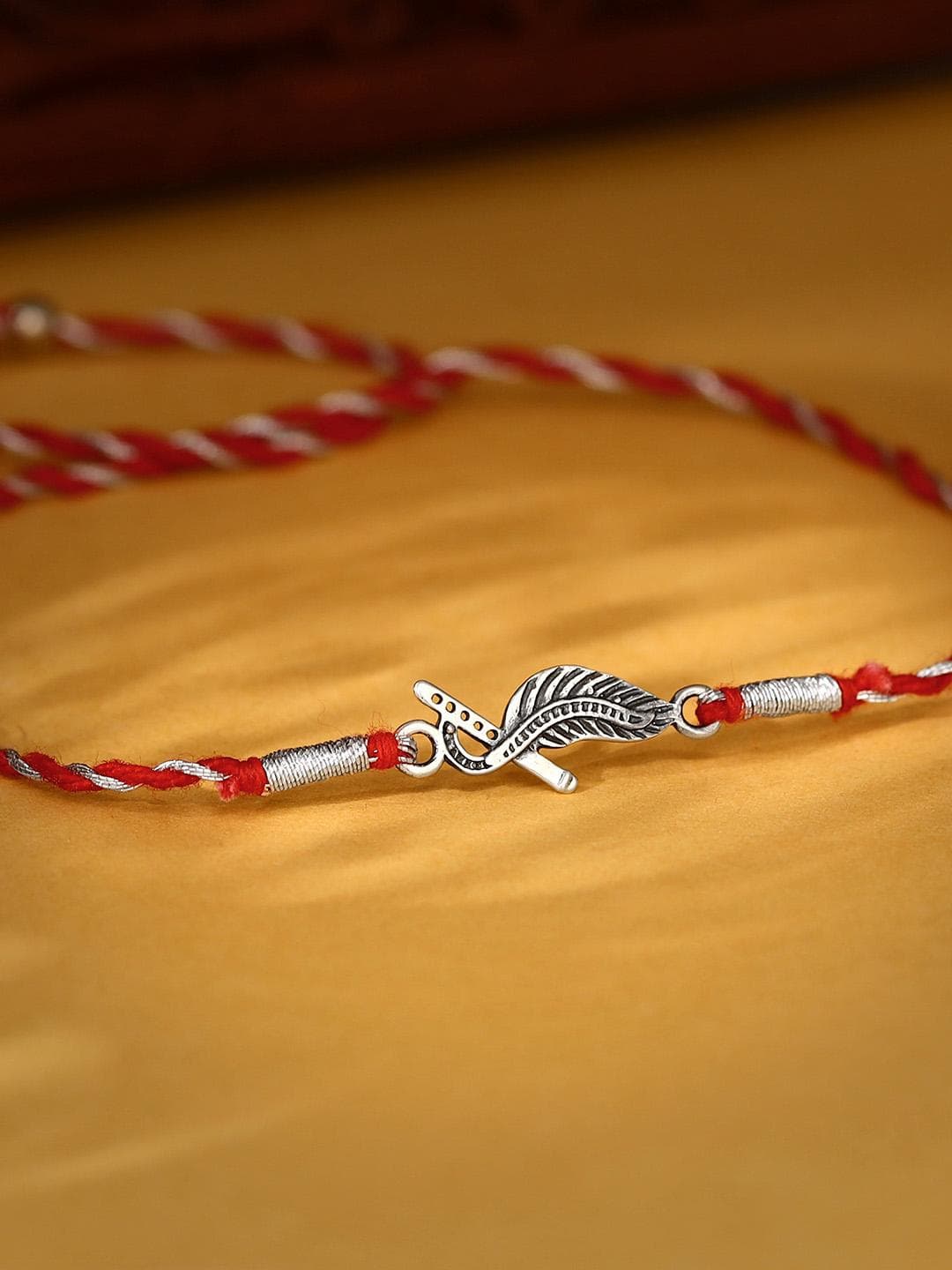 Buy GIVA Silver Toned 925 Sterling Silver Krishna Rakhi With Roli Chawal - - Accessories for Men
