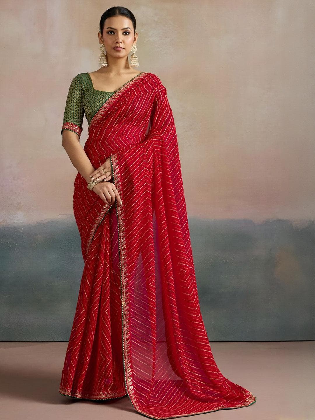 Mitera Striped Sequinned Pure Georgette Leheriya Saree