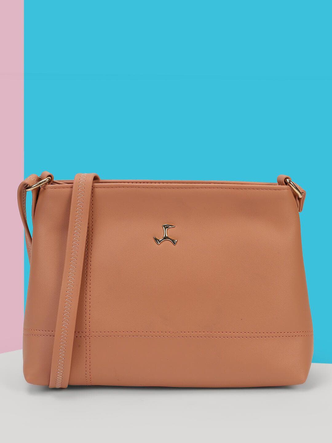Mochi Tasselled Baguette Sling Bag