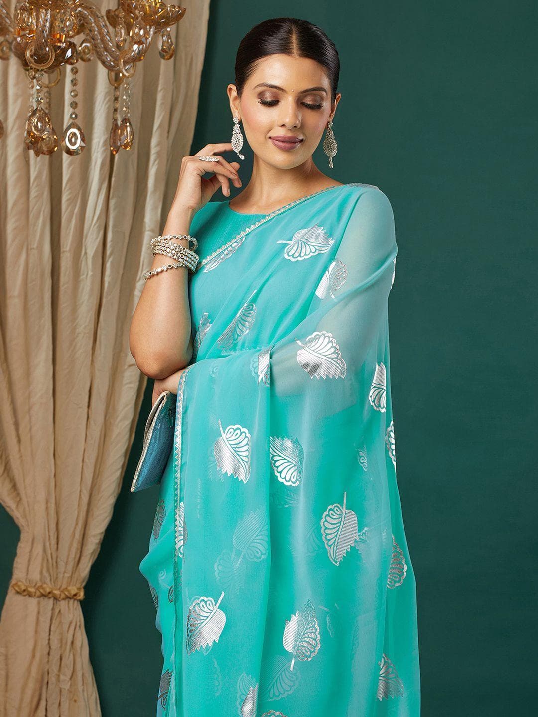 KALINI Turquoise Blue Pure Georgette Embellished Sarees