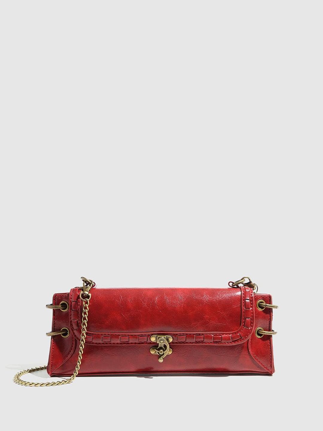 CORSICA Textured PU Structured Sling Bag with Tasselled