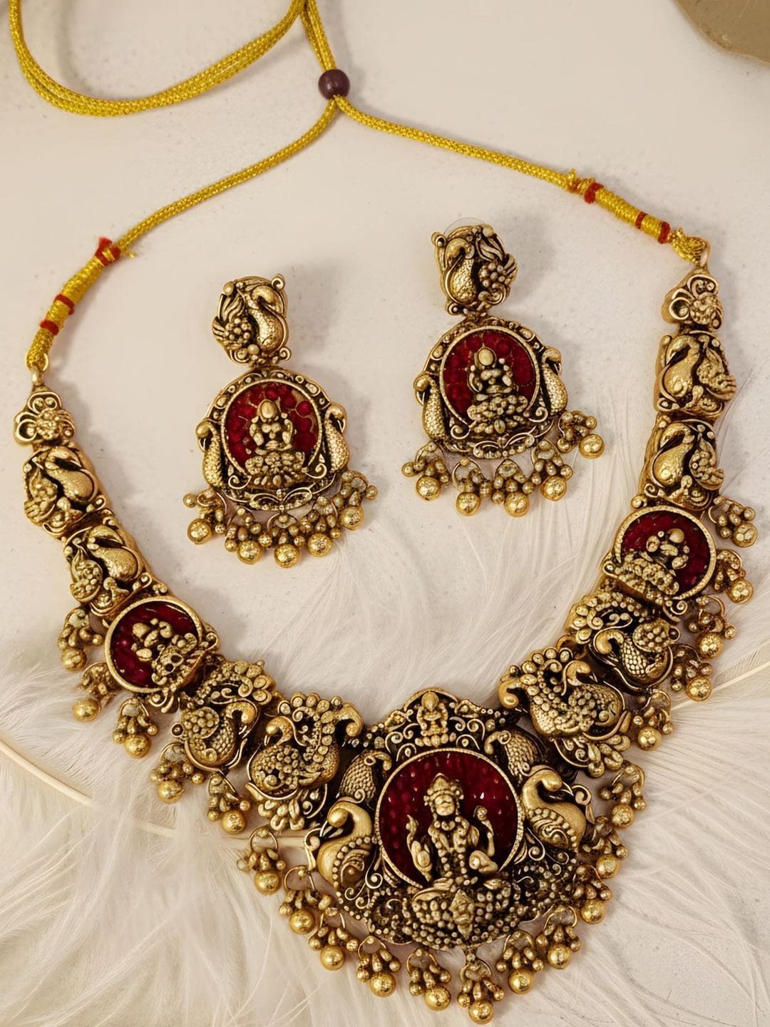 KARATCART Red Gold-Plated Crystals Stone-Studded Goddess Lakshmi Temple Antique Jewellery Set