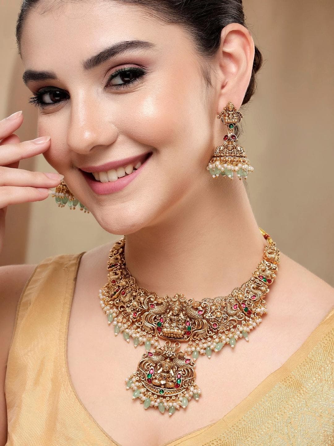 KARATCART Gold-Plated Stone-Studded & Beaded Lakshmi Mata Temple Jewellery Set