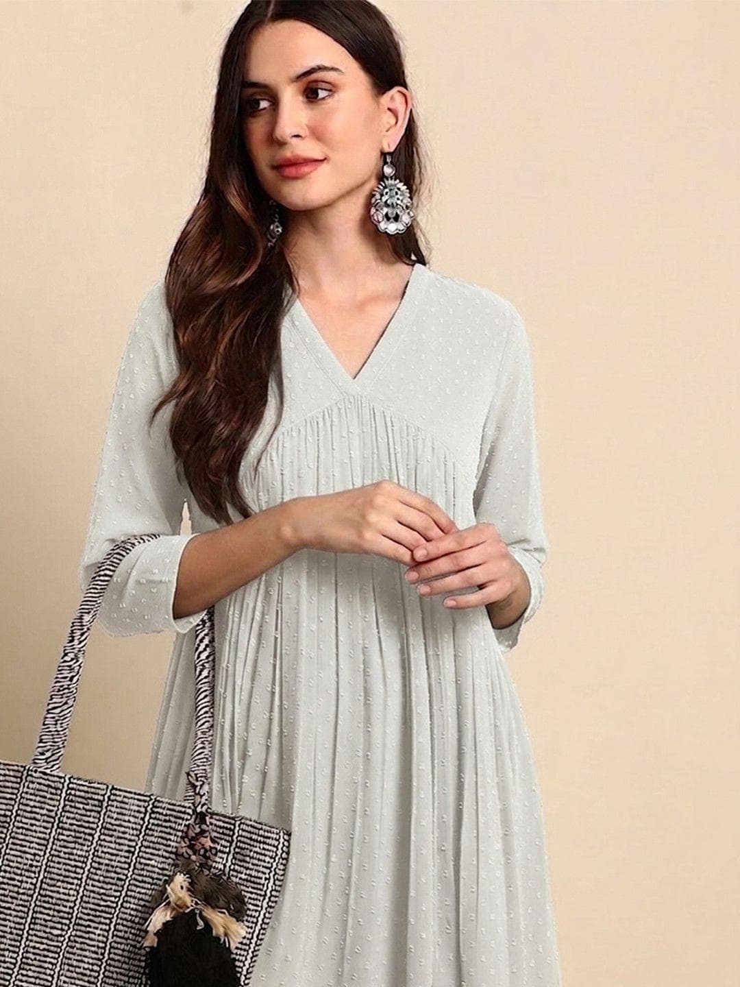 Janasya Women Off White Dobby Chiffon Self Design Flared Kurta