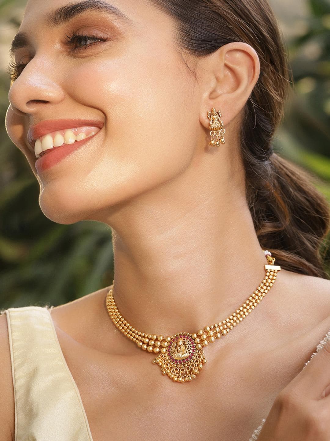 Buy Rubans 22K Gold Plated Ruby Studded Gold Beaded Goddess Laxmi Motif Temple Jewellery Set - - Accessories for Women