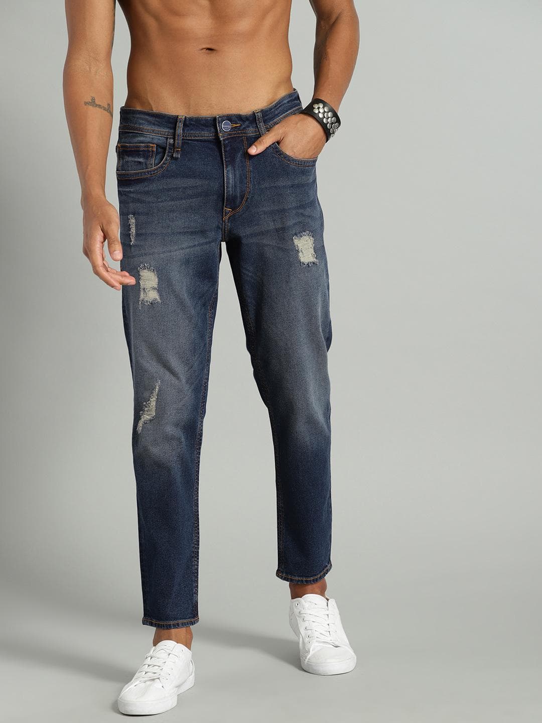 Roadster Men Navy Blue Carrot Regular Fit Mid-Rise Mildly Distressed Stretchable Jeans